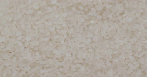 Stack of white rice close up