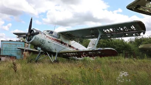 An Abandoned And Destroyed Planes Are in The Field