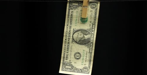 Dollar Hanging From a Rope on Black