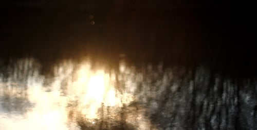 Sonnenschein: Bokeh-Reflexion im Flusswasser 3