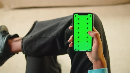African American Man Using Smartphone with Chroma Key Closeup