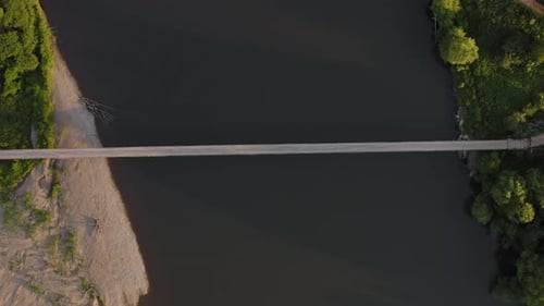 Aerial View Vertically Down of a Suspension Bridge on Steel Ropes