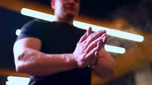 Man Clap Hands with Powder in Gym Get Ready to Working Out