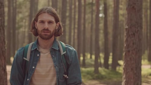Portrait of Young Caucasian Man in Forest