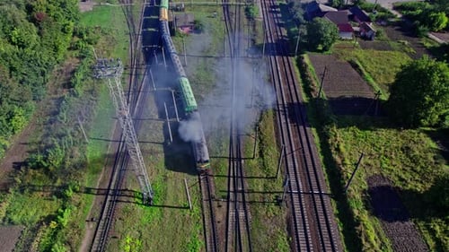 Aerial View of Train on Railroad Tracks