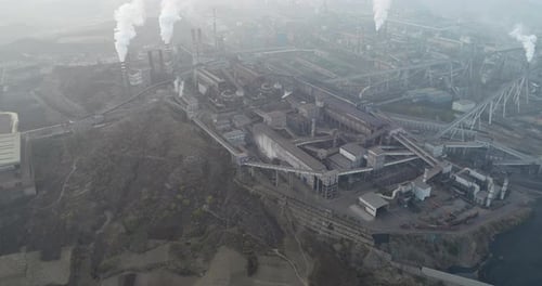 Aerial View of Big Factory in China. Air Pollution By Smoke Coming Out of Chimneys