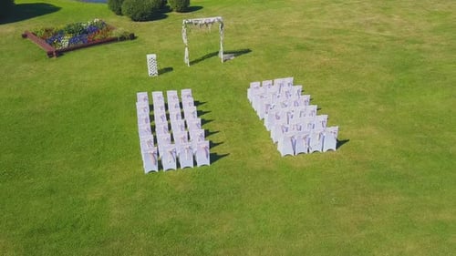 Wedding Site on Green Grass Lawn on Sunny Day Aerial View