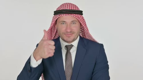 Man in Headscarf Gives Thumbs Up Gesture