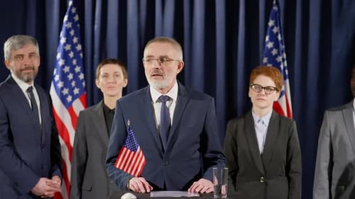 Speaker Delivers a Political Speech with Supporters