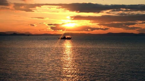 Sunset Boat Ride on Calm Ocean Waters