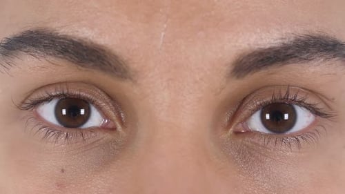 Young Latin Woman Blinking Eyes