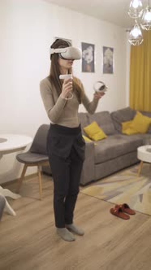 Woman Enjoys Virtual Reality at Home