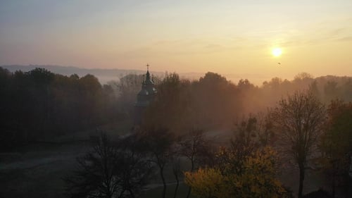 Ukraine. Ukrainian village in autumn. Aerial view. Ukrainian windmill. Foggy morning.