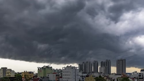 Ominous Storm Clouds Over Modern City Skyline