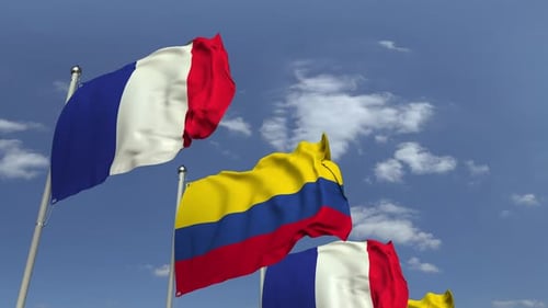 Realistic France and Colombia Flags Waving in Blue Sky
