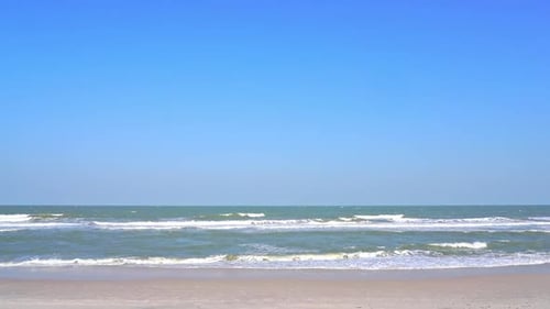 Beautiful tropical beach sea ocean with blue sky and white cloud