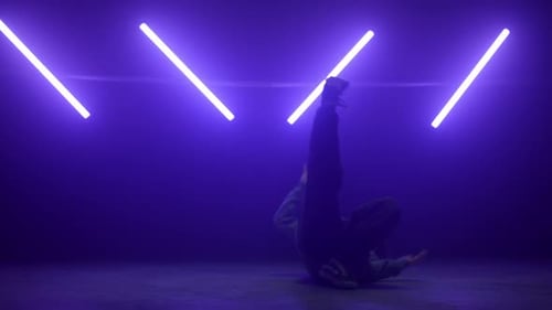 Hiphop Performer Making Tricks on Stage