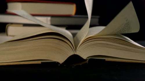 Open Book Pages Turning Close Up