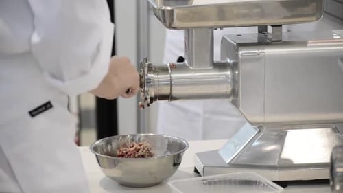 Meat Grinder Processes Raw Meat Indoors