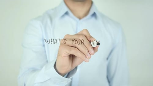 Man Writing 'What's Your Name?' on Glass