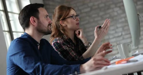 Business People and Colleagues Brainstorming and Working in Office