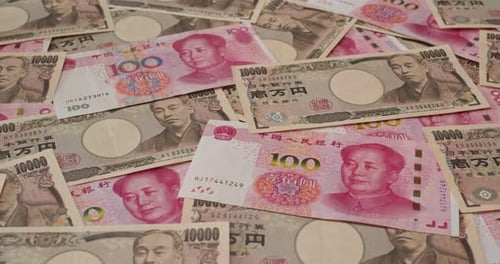 Japanese Yen and Chinese Renminbi Currency Close Up