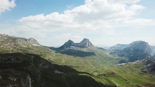 Mountain valley with rocky cliffs
