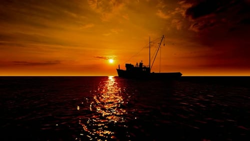 Fishing Boat in the Sea at Sunset