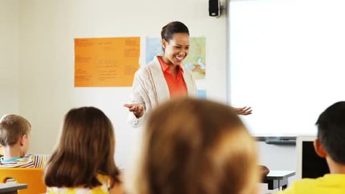 Teacher Leads Elementary School Class Lecture