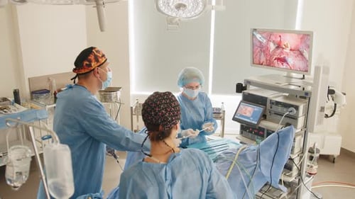 View From Above Surgeons Team Preforming Operation in Hospital Operating Theater