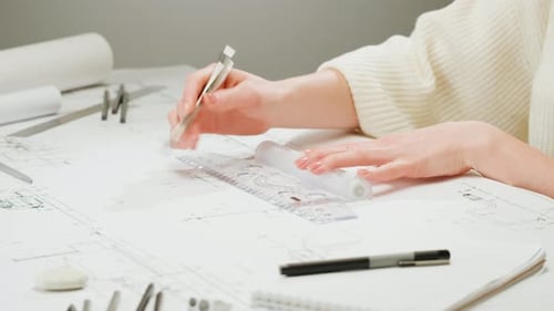 Architect Designer Drawing Plan Blueprint Closeup