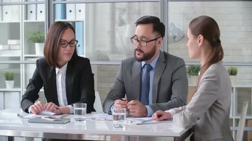 Business Team Meeting in Modern Office