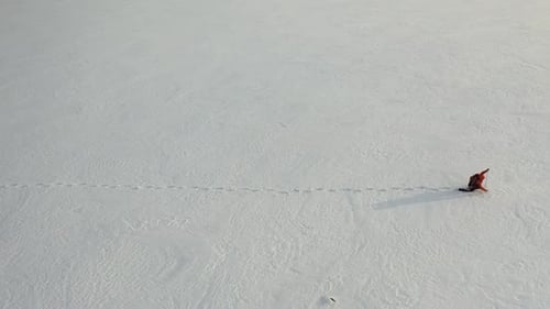 Survival in Extreme Cold Conditions a Lone Traveler with a Backpack Falls Gets Up and Walks Through