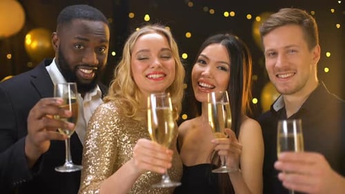 Friends Celebrating with Champagne at a Party