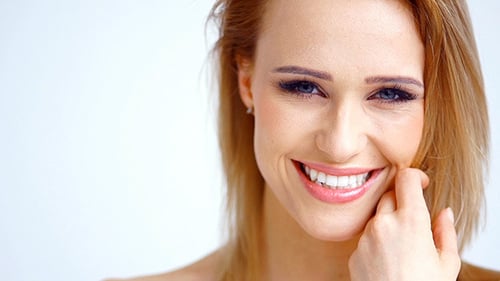 Attractive Woman Posing and Smiling in Close Up