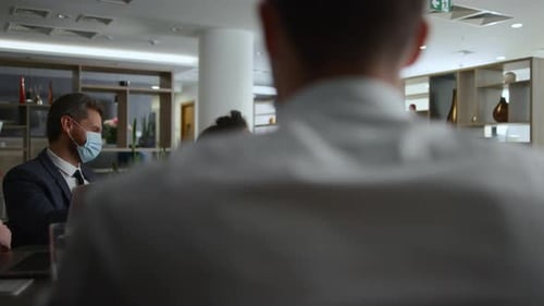 Multiethnic Office Workers Discuss Financial Plan