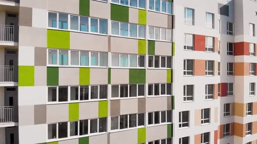 Aerial View. In the Frame Is the Facade of an Apartment Building. Cheap Multi-storey House with