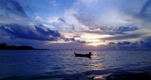Wide angle fly over abstract shot of a white sand paradise beach and aqua turquoise water background