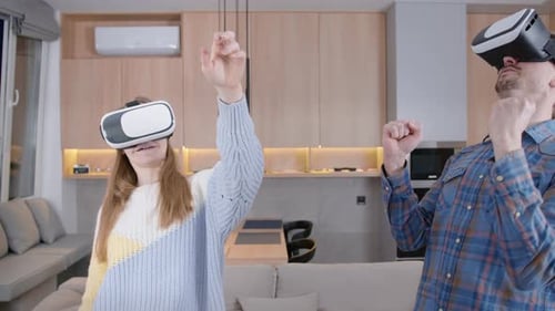 Couple Immersed in Virtual Reality at Home