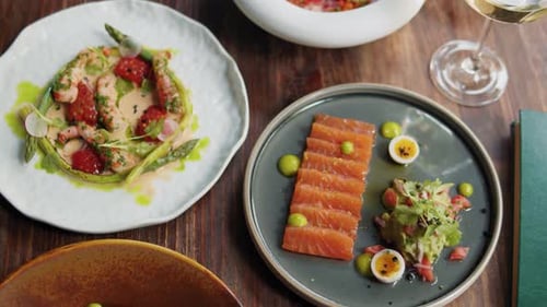 Set Table with Gourmet High Kitchen Dinner Plates and Dishes at the Restaurant