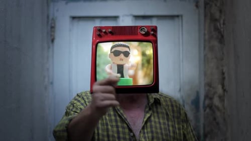 Adult Wearing a Vintage Television on Head