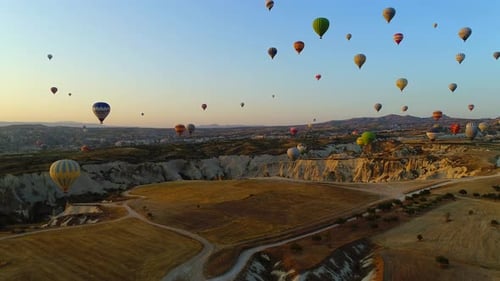 Breathtaking Hot Air Balloons Soar Over Cappadocia Landscape