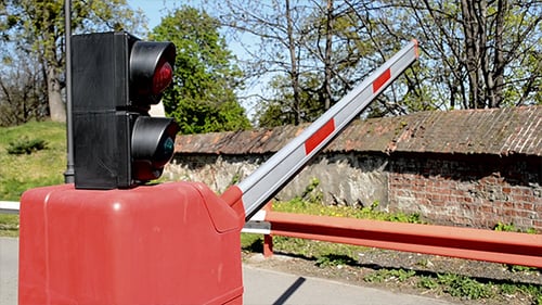 Barrier Rises to Pass a Car