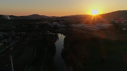 Golden Sunset Over Tranquil River Landscape