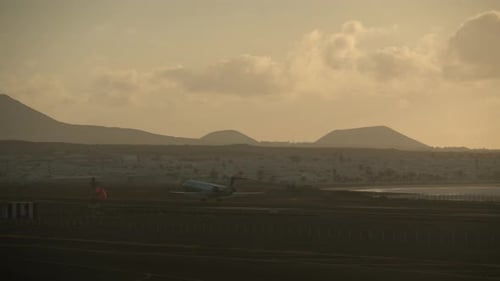 Airplane Arrival To Scenic Coastal Town