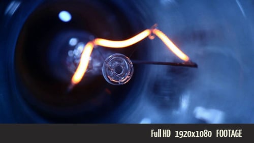 Light Bulb Filament Igniting in Extreme Close-Up