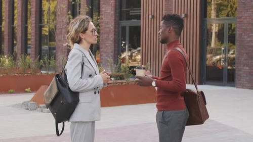 Business Partners Shaking Hands Outdoors