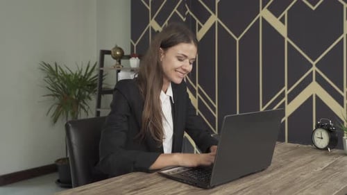 Smiling western business woman, white person working from home with computer notebook laptop