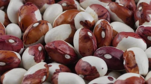 Close Up of Rotating Red and White Speckled Beans