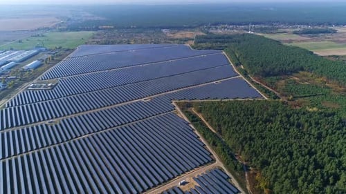 Aerial Drone Footage. Flight Over Solar Panel Farm. Renewable Green Alternative Energy